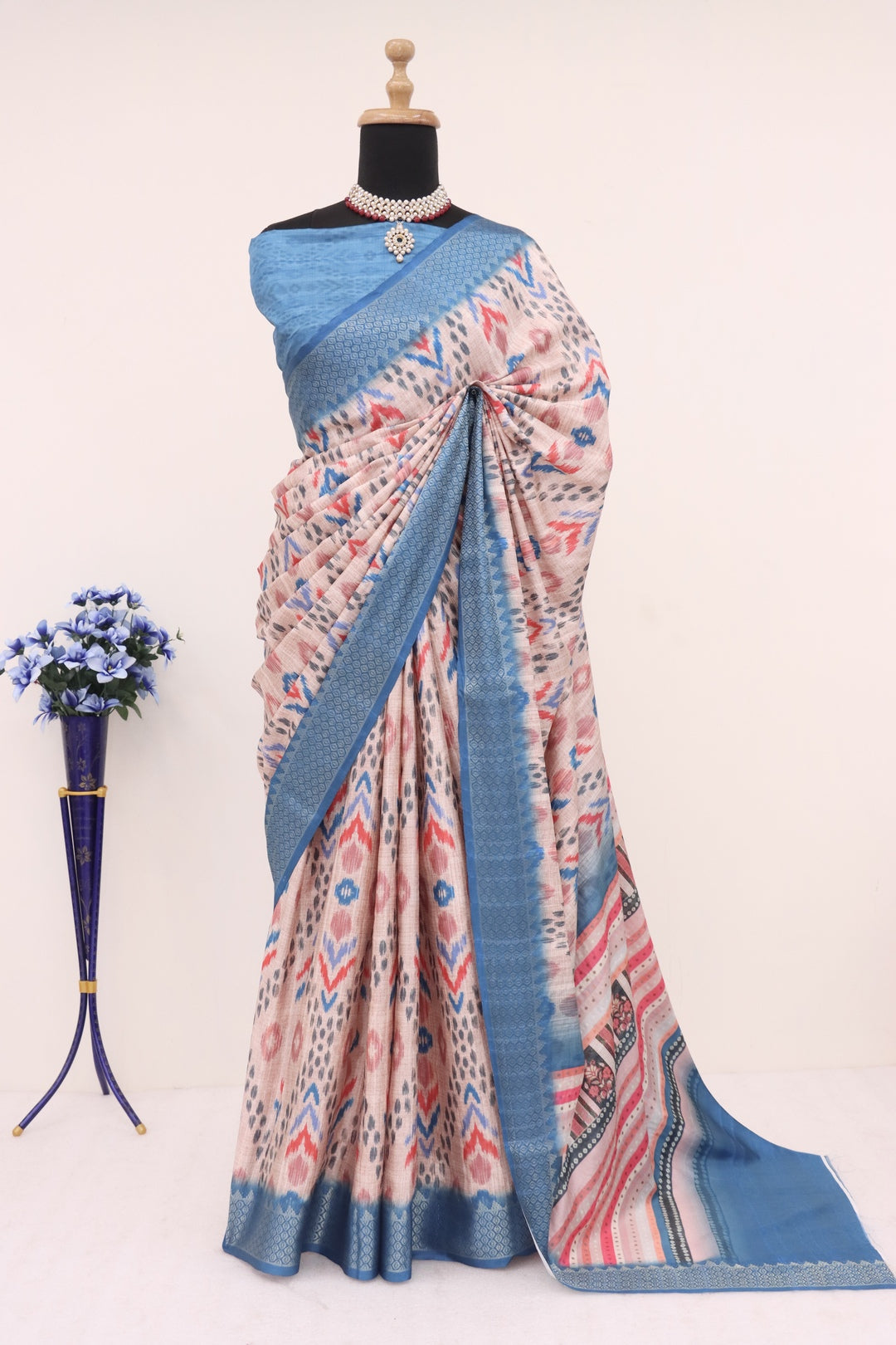 Skin and Blue Printed Silk Saree