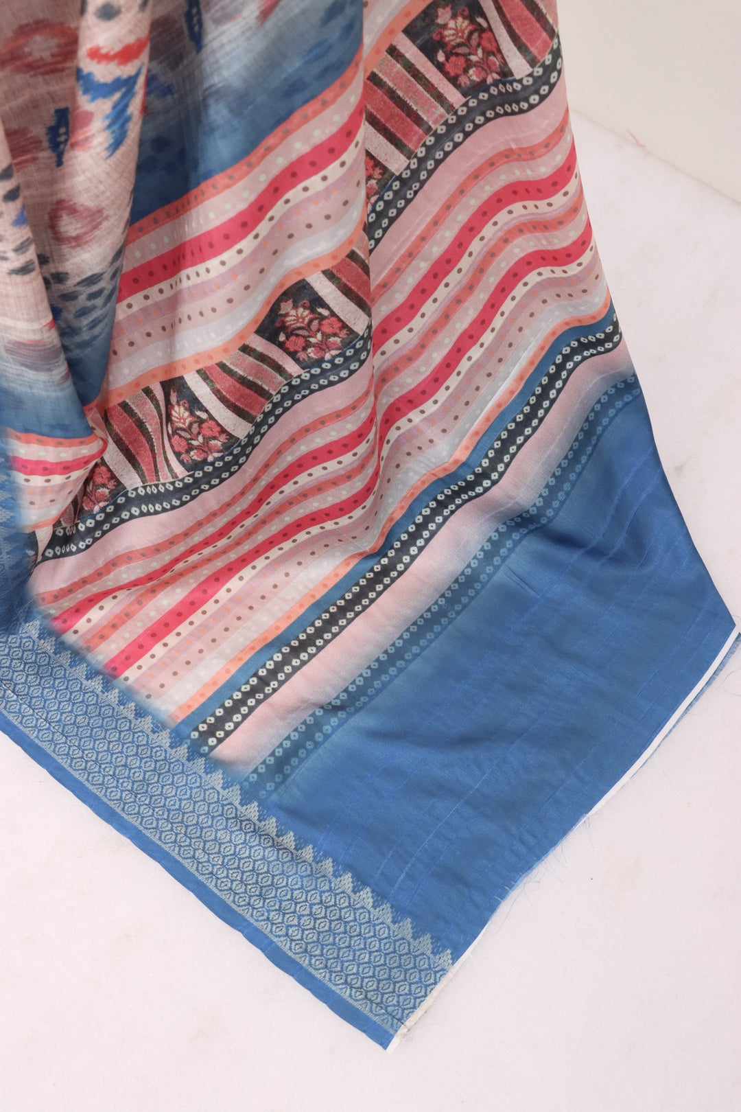 Skin and Blue Printed Silk Saree