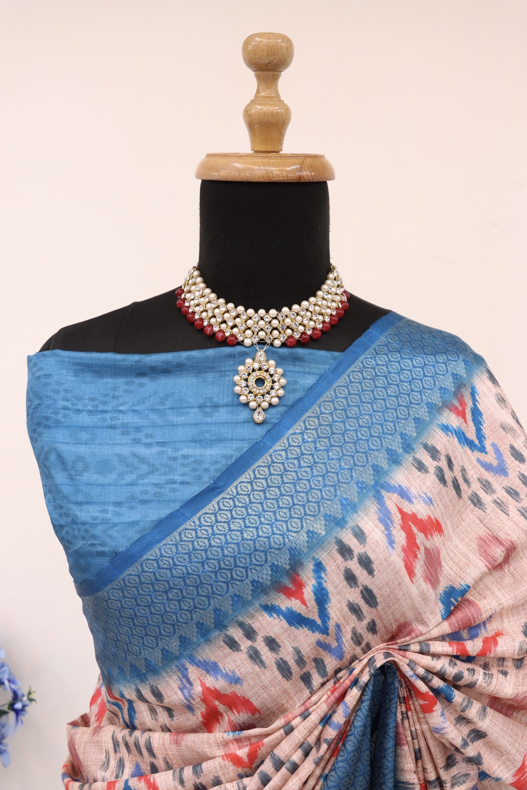 Skin and Blue Printed Silk Saree