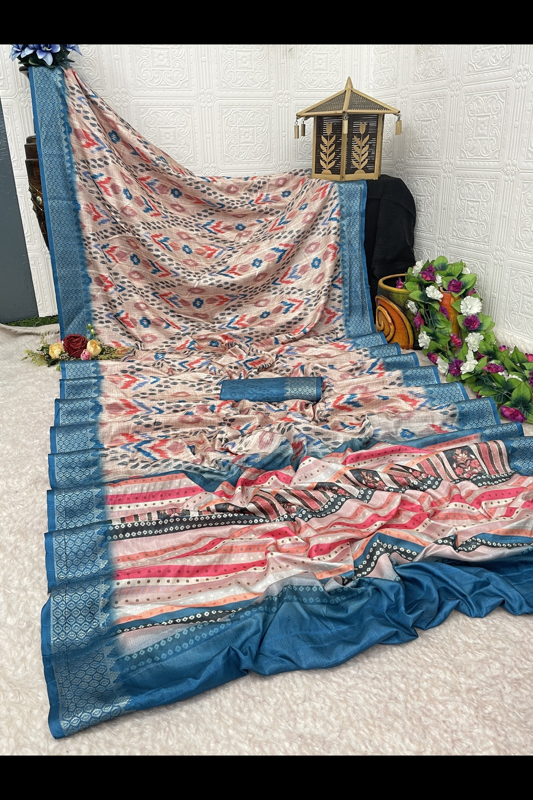 Skin and Blue Printed Silk Saree