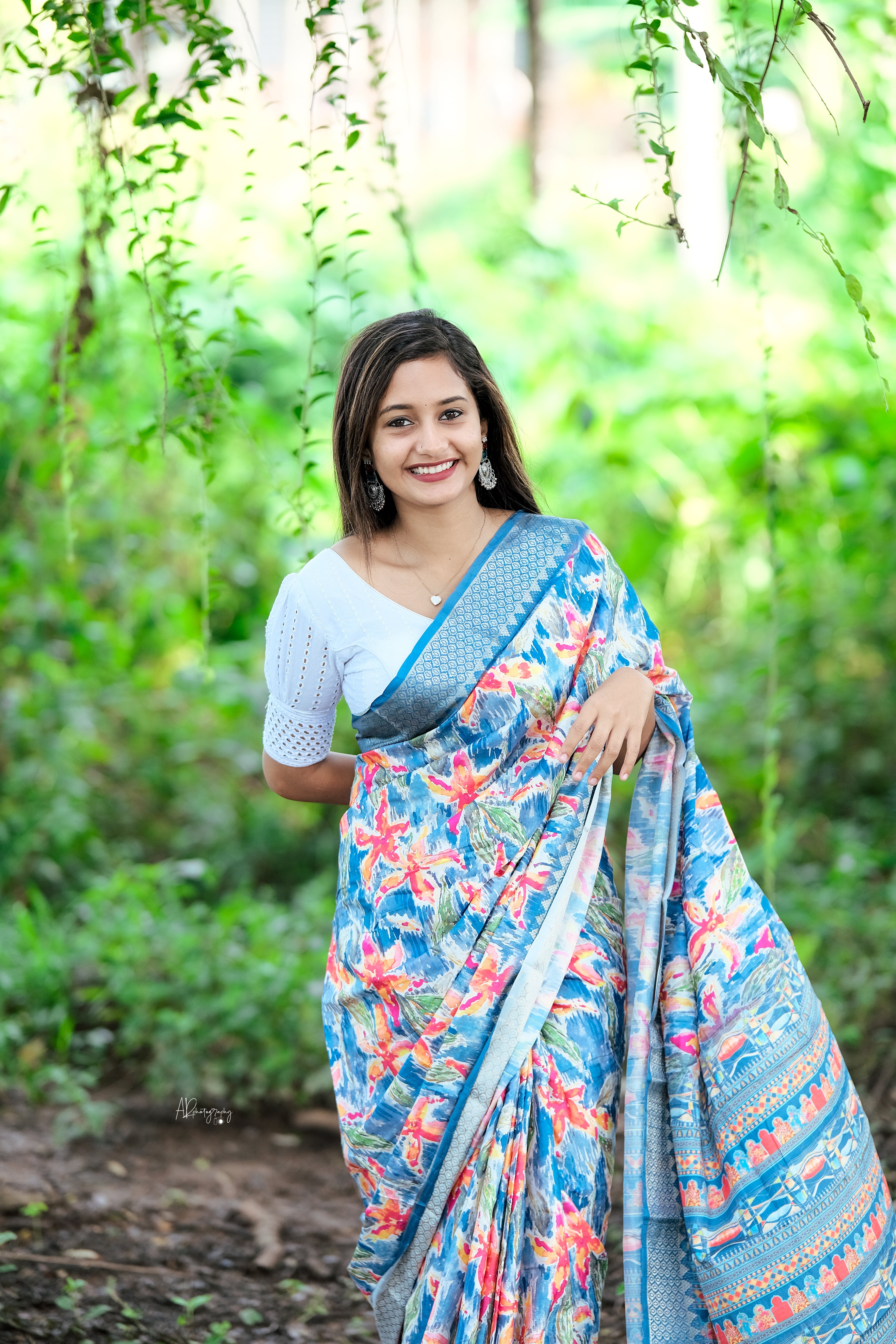 Royal Blue Dola Silk Digitally Printed Saree Weaved With Attractive Lace Comes With Tassels