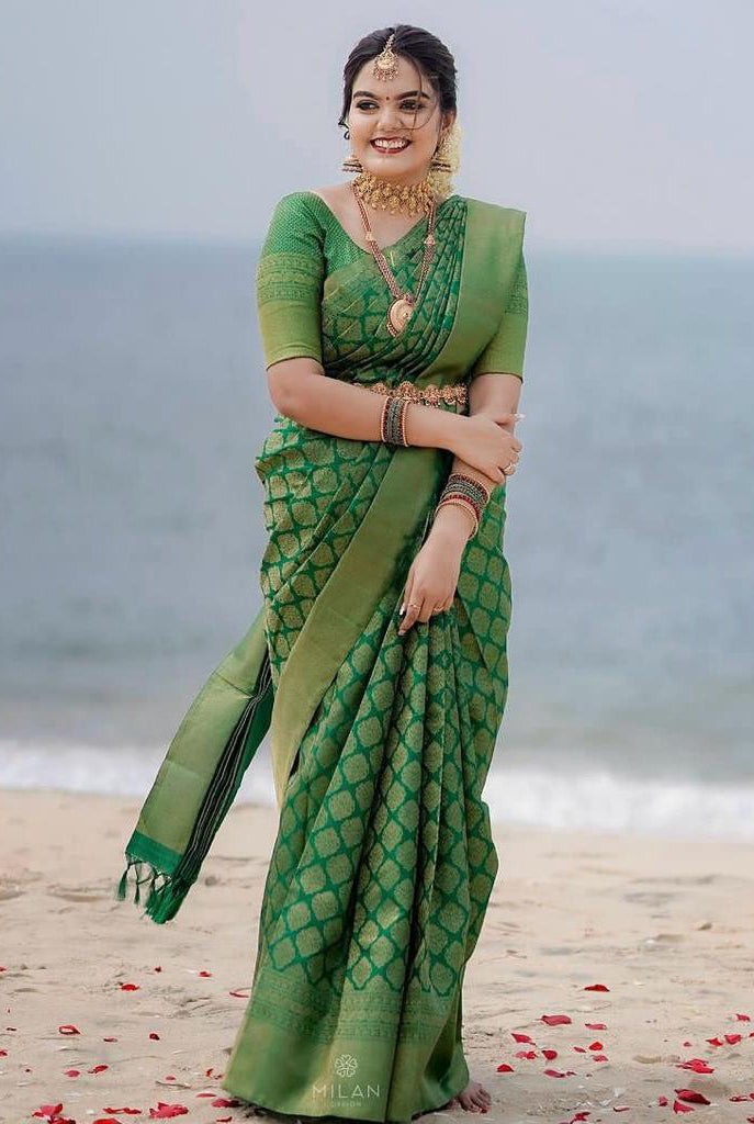 Stunner Green Soft Silk Saree With Opulent Blouse Piece