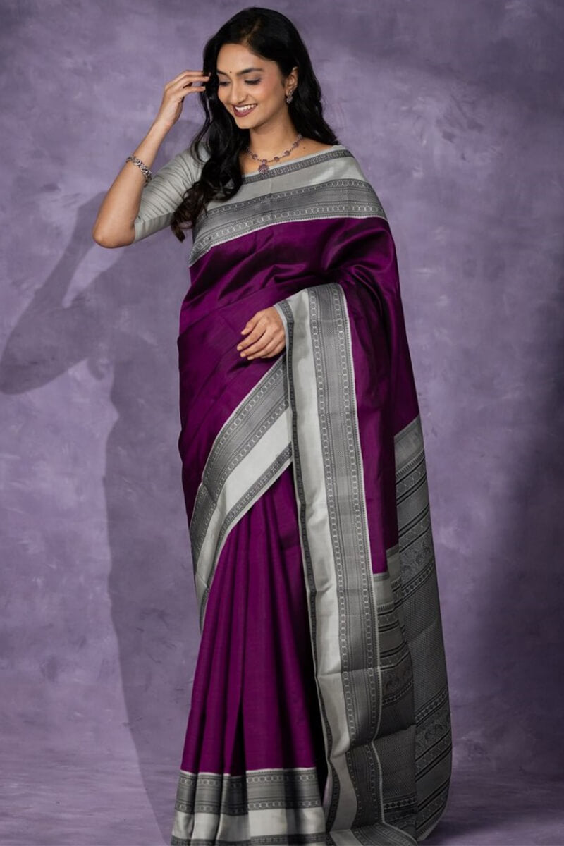 Supernal Wine Soft Silk Saree With Enigmatic Blouse Piece