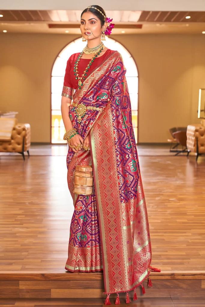 Demanding Purple Patola Silk Saree with Desiring Blouse Piece