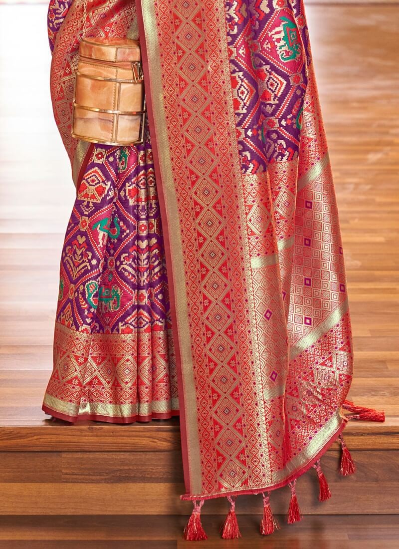 Demanding Purple Patola Silk Saree with Desiring Blouse Piece