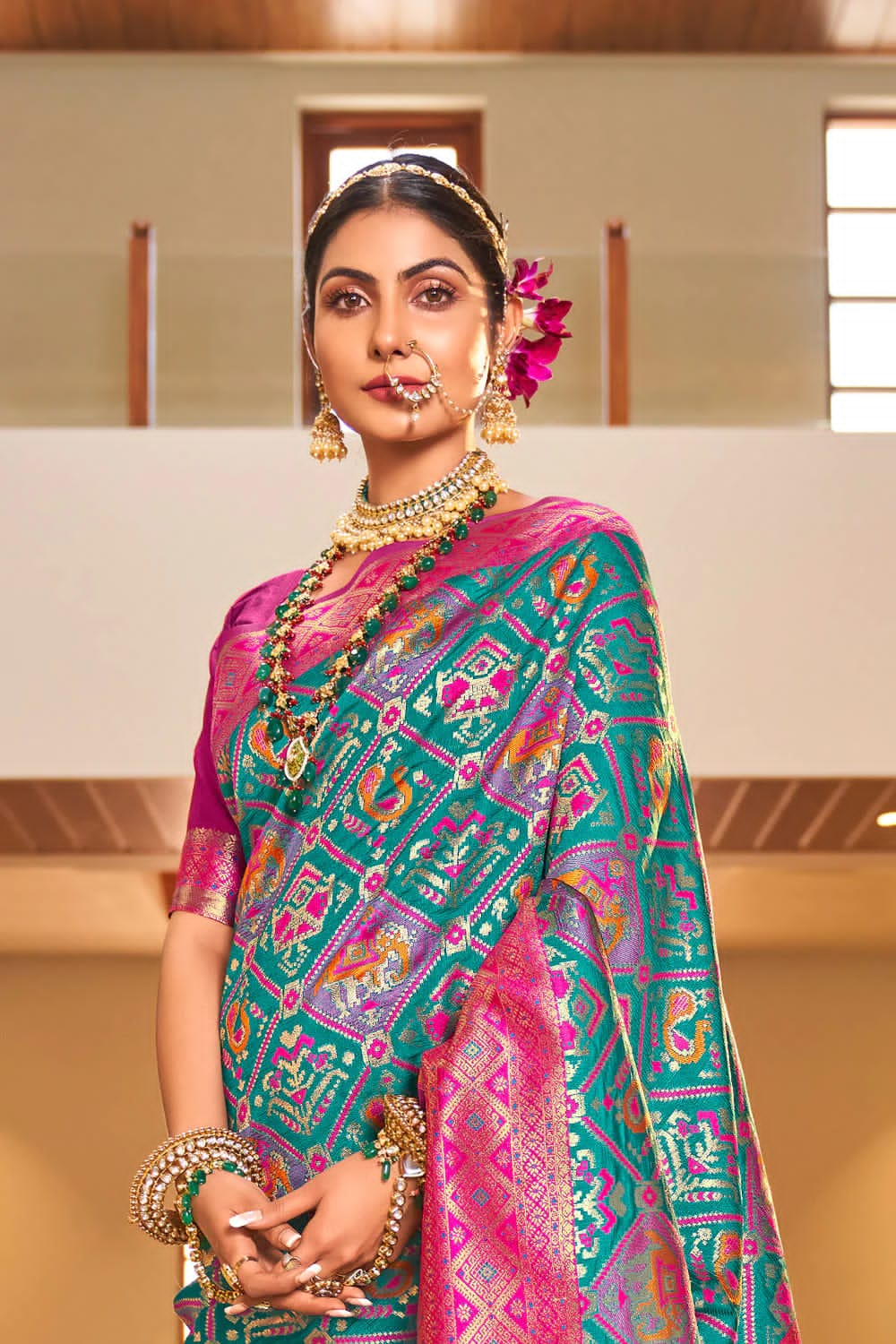 Outstanding Turquoise Patola Silk Saree with Invaluable Blouse Piece