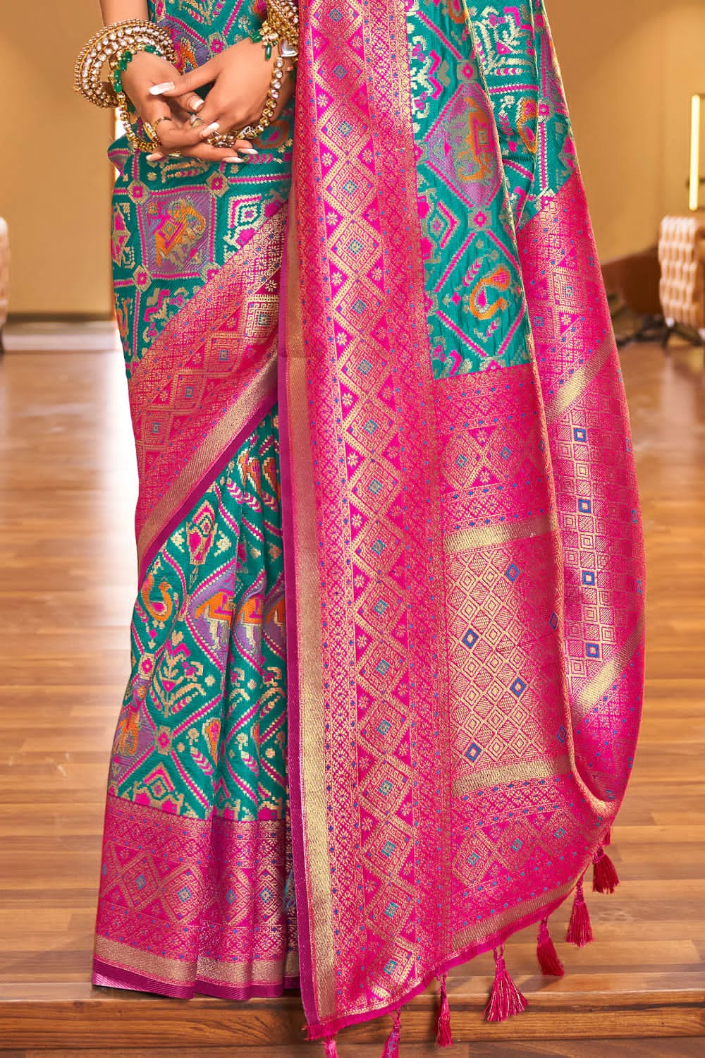 Outstanding Turquoise Patola Silk Saree with Invaluable Blouse Piece