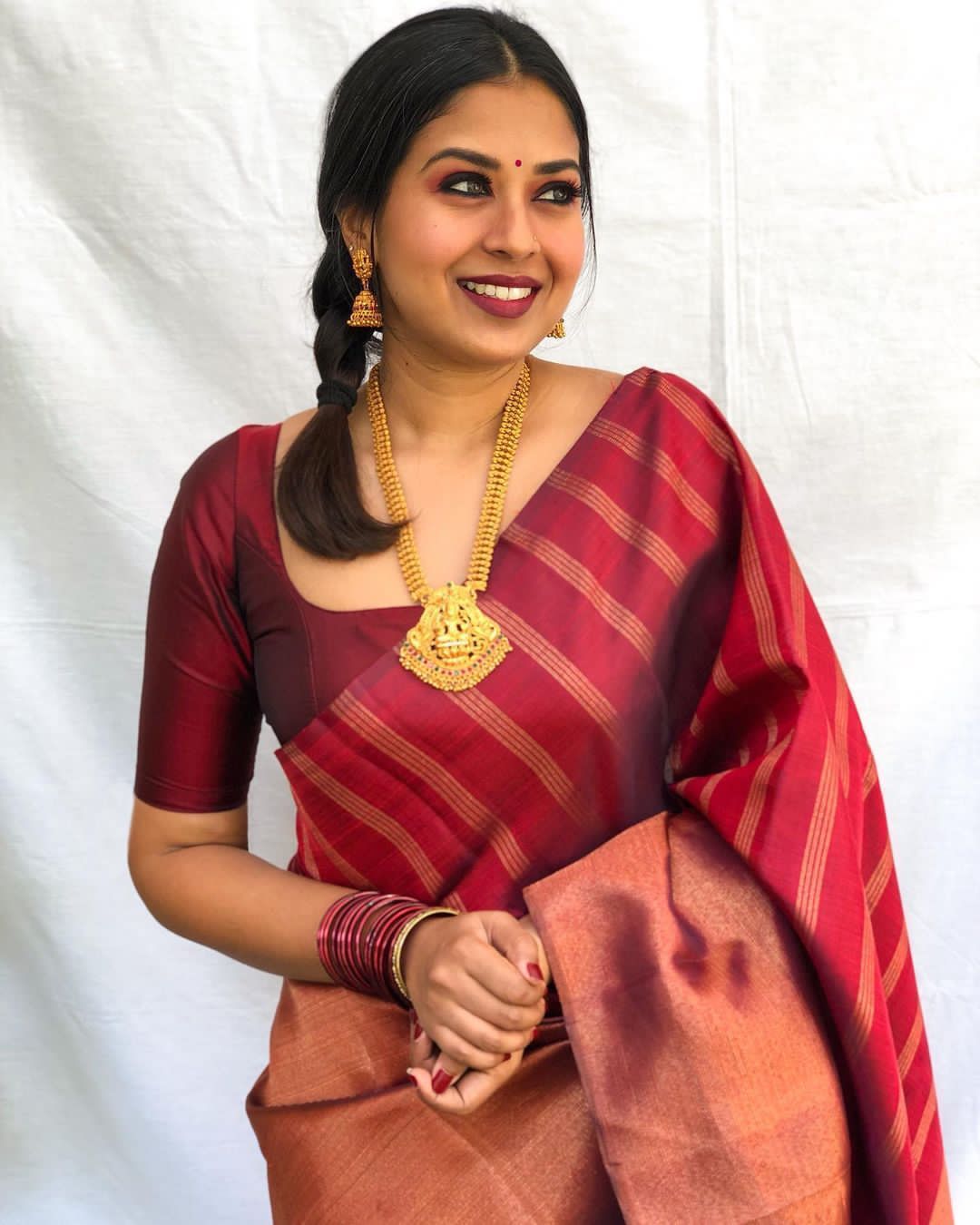 Seraglio Maroon Soft Banarasi Silk Saree with Vestigial Blouse Piece