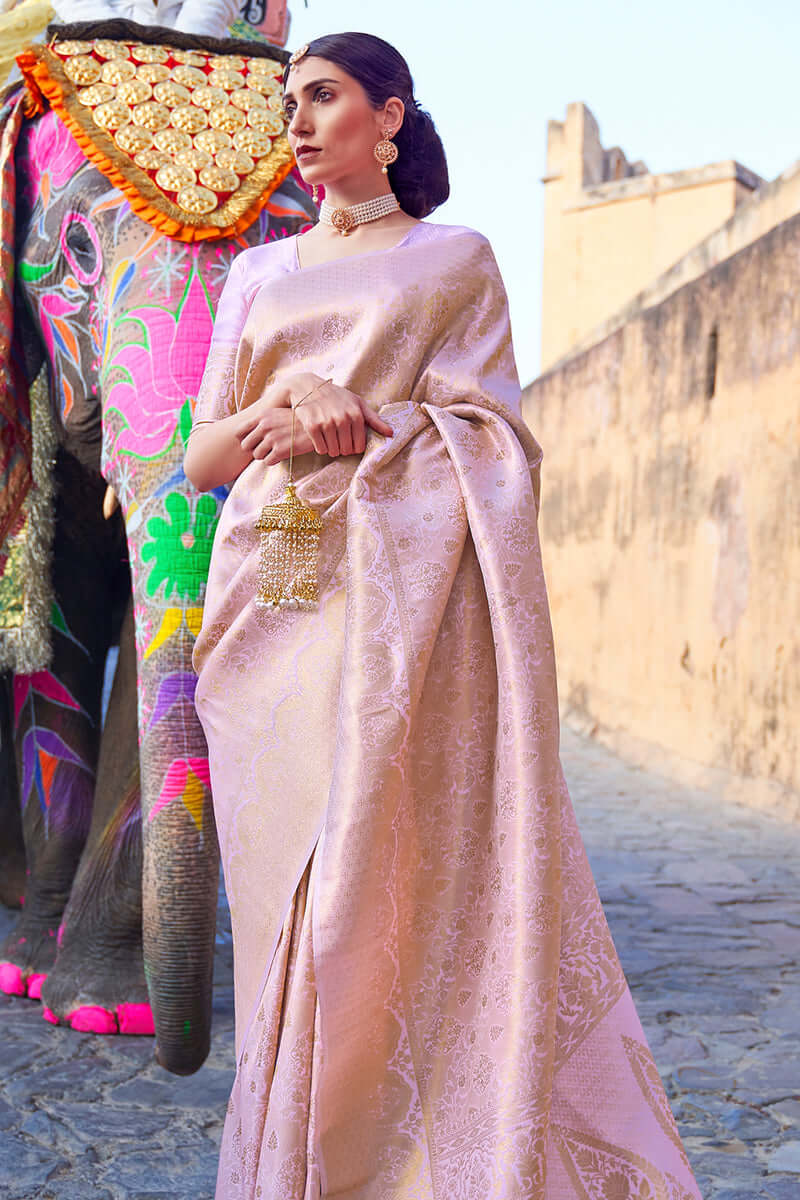 Prominent Baby Pink Kanjivaram Silk Saree with Entrancing Blouse Piece