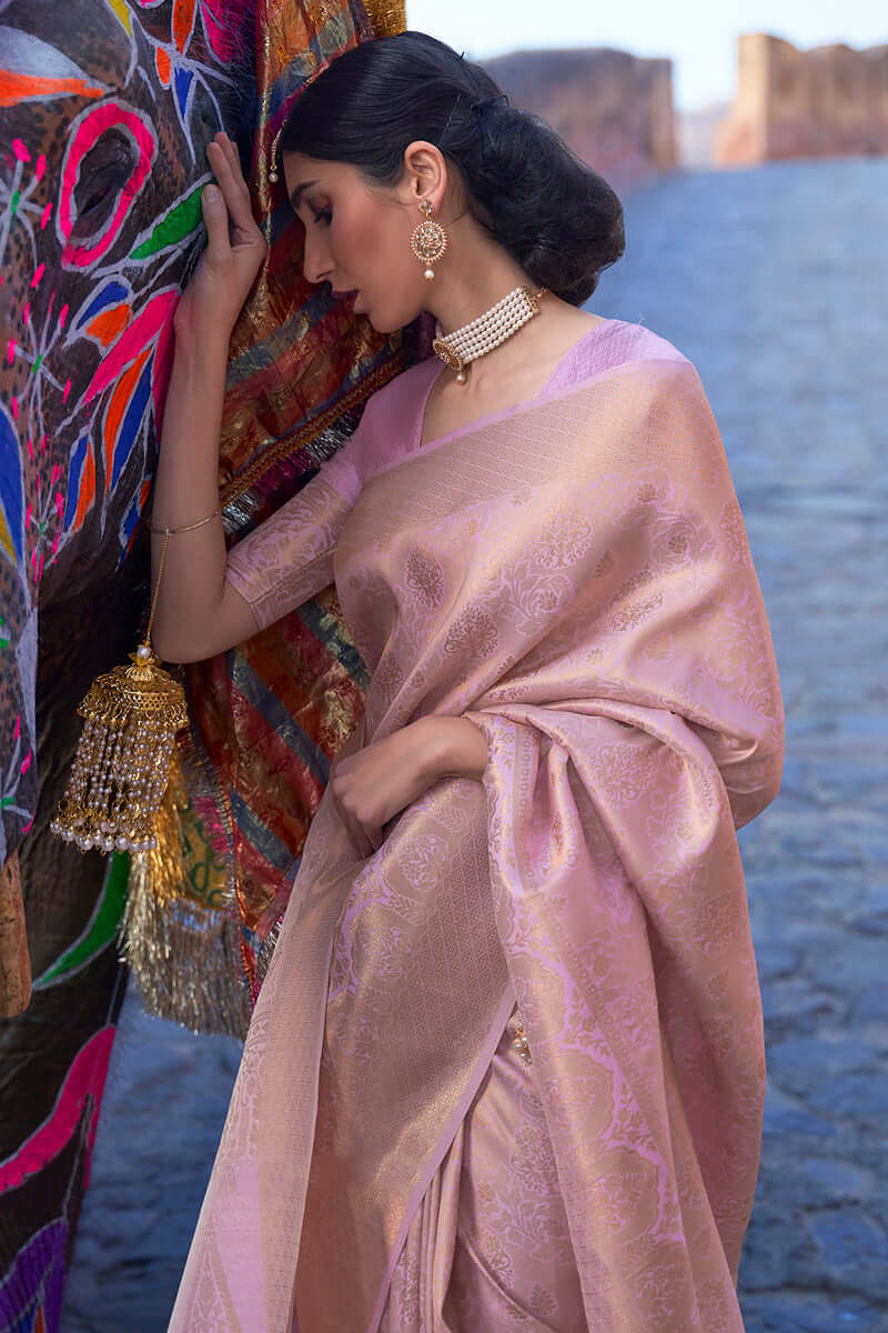 Prominent Baby Pink Kanjivaram Silk Saree with Entrancing Blouse Piece