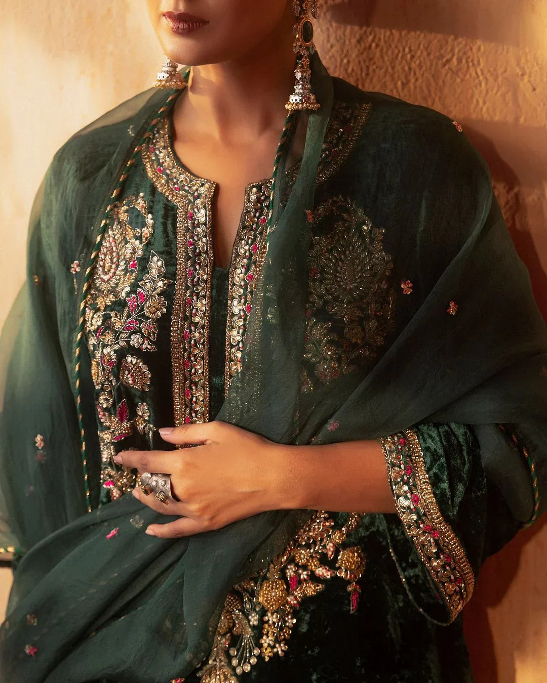 Elegant green velvet suit with golden embroidery and dupatta