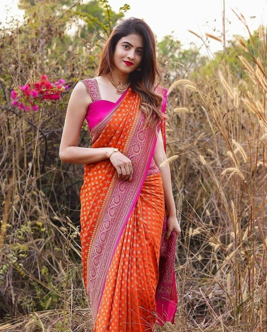 Prettiest Orange Soft Banarasi Silk Saree With Twirling Blouse Piece