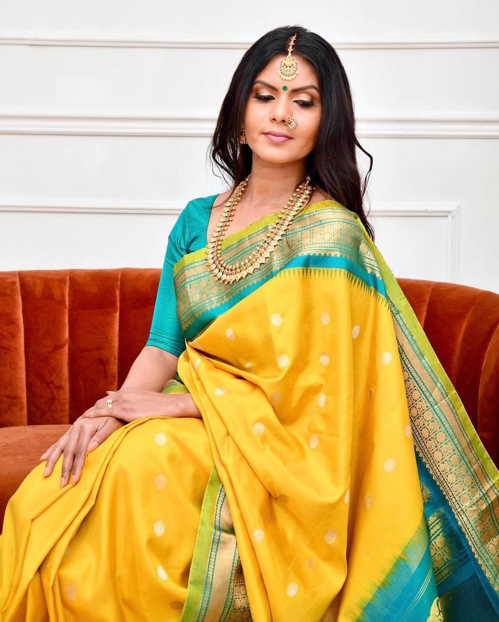 Staring Yellow Soft Banarasi Silk Saree With Charming Blouse Piece