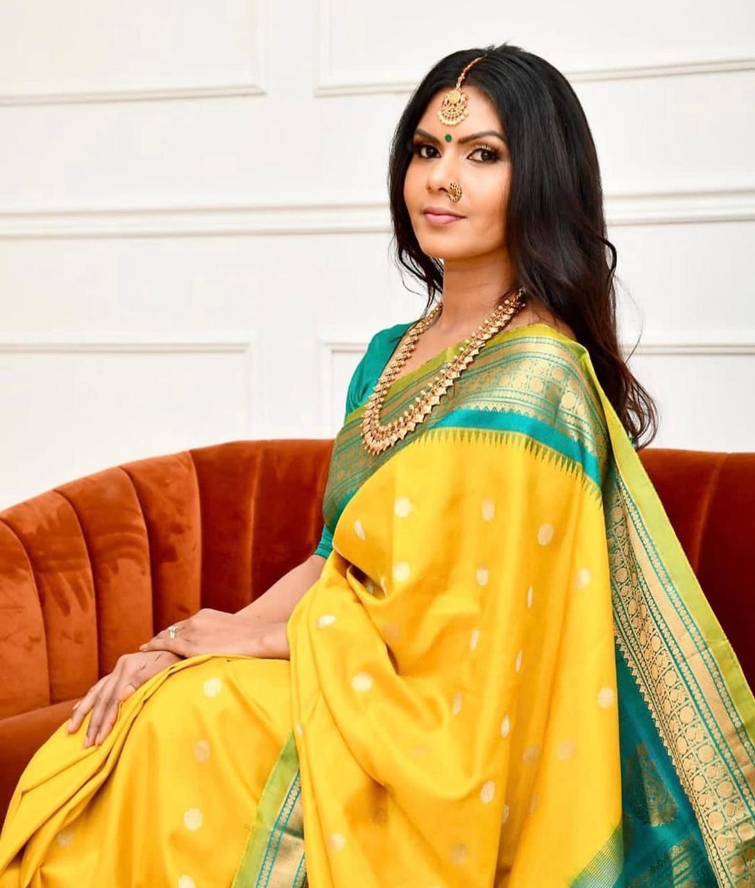 Staring Yellow Soft Banarasi Silk Saree With Charming Blouse Piece