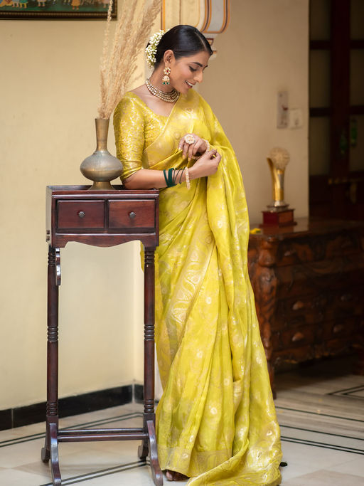 Traditional Yellow Soft Silk Saree With Twirling Blouse Piece