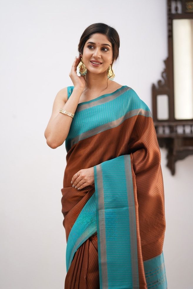 Ravishing Brown Soft Silk Saree With Opulent Blouse Piece