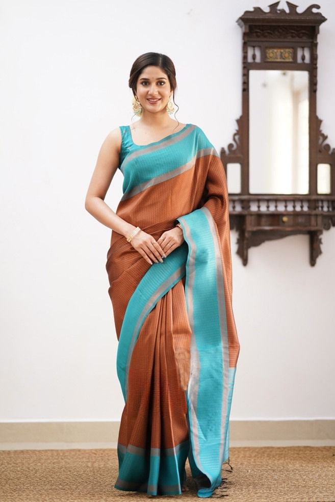 Ravishing Brown Soft Silk Saree With Opulent Blouse Piece