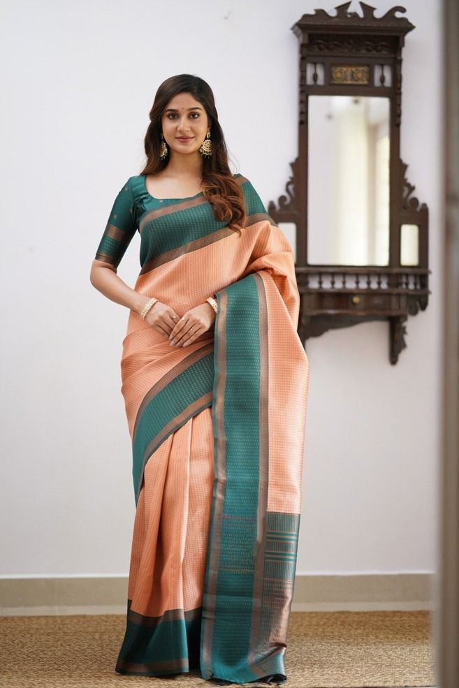 Prominent Peach Soft Silk Saree With Delightful Blouse Piece