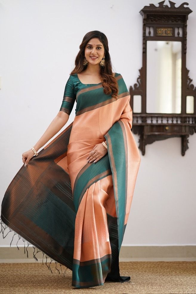 Prominent Peach Soft Silk Saree With Delightful Blouse Piece