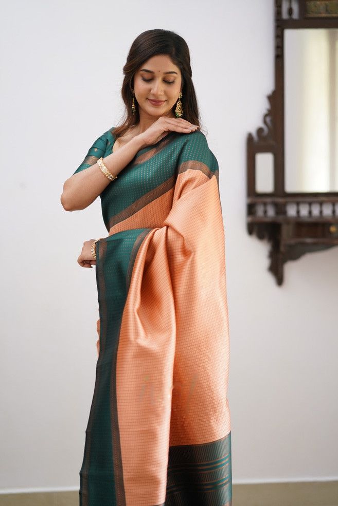 Prominent Peach Soft Silk Saree With Delightful Blouse Piece