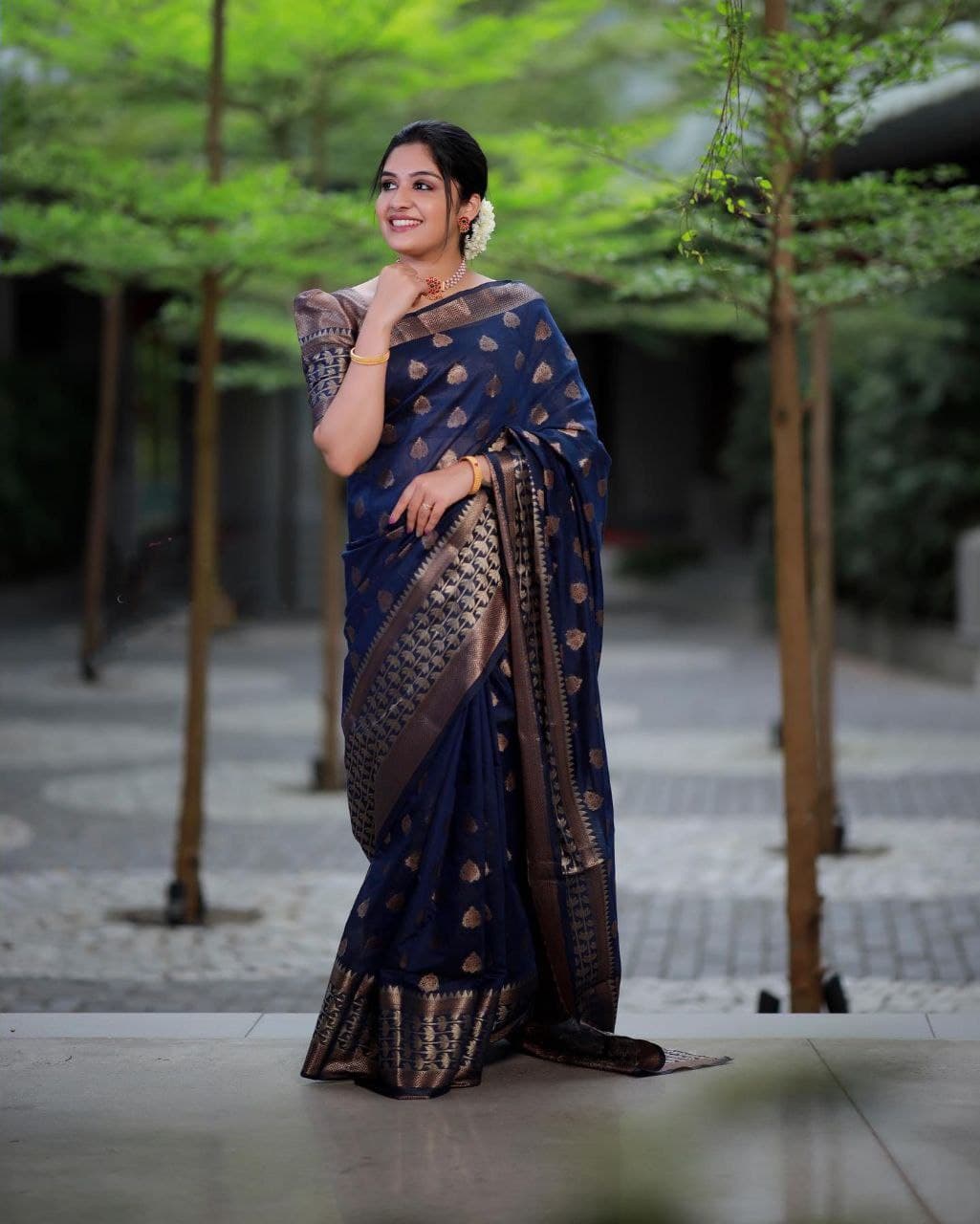 Surpassing Navy Blue Soft Banarasi Silk Saree With Glowing Blouse Piece