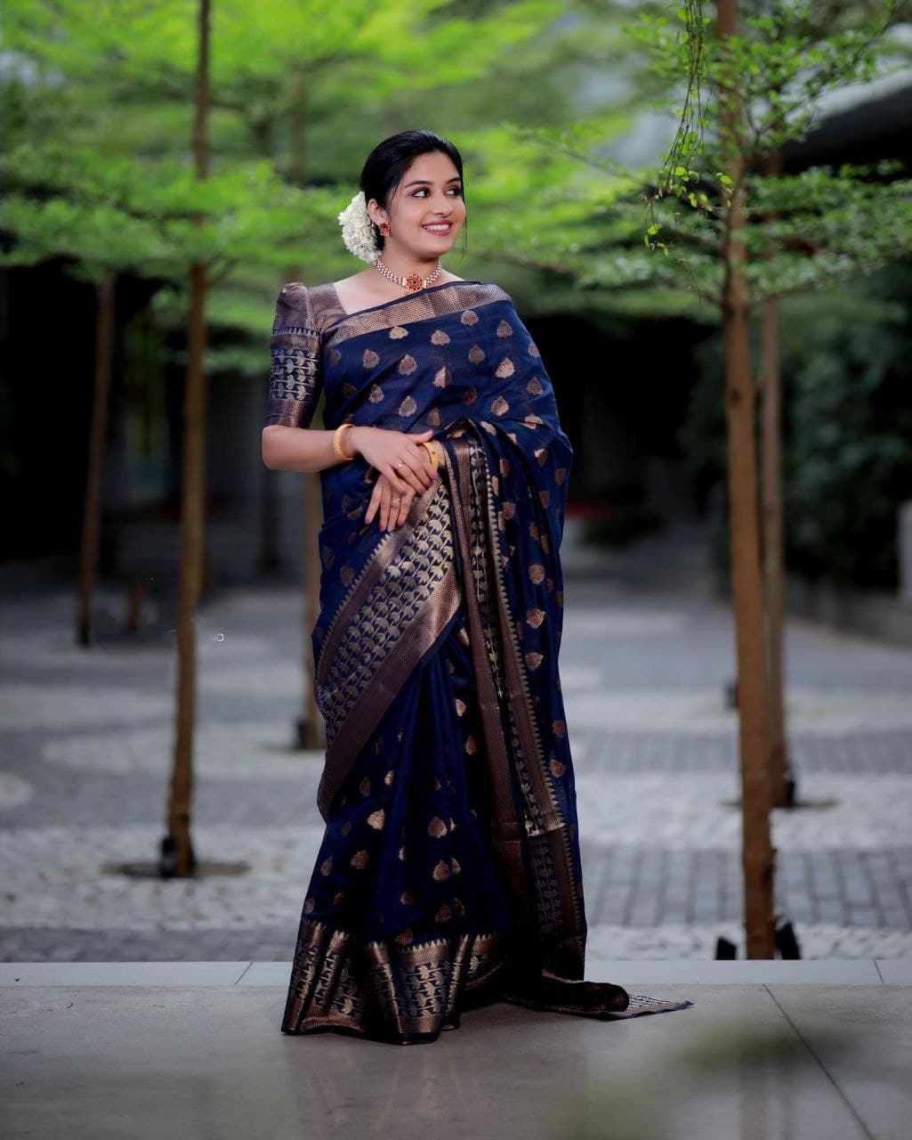 Surpassing Navy Blue Soft Banarasi Silk Saree With Glowing Blouse Piece